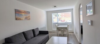Your ideal home away from home! Modern apartment, free wifi and parking