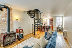 TV, fireplace, books