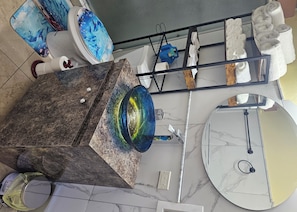 Shower, towels, soap, toilet paper