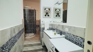 Hair dryer, bidet, towels, soap