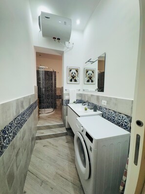 Hair dryer, bidet, towels, soap