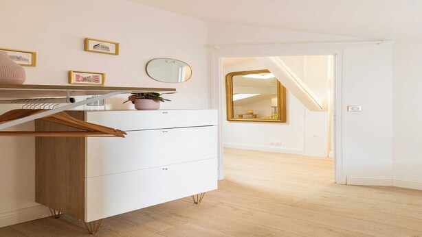 A modern bedroom with a white dresser, a mirror, and a wooden desk. - DIFY Reinach - Jean Macé (Lyon)