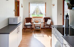 Fridge, stovetop, dishwasher, coffee/tea maker