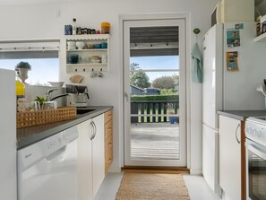 Fridge, microwave, dishwasher, cookware/dishes/utensils