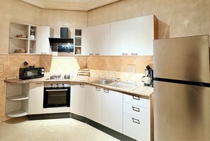 Microondas, horno y parrilla de estufa