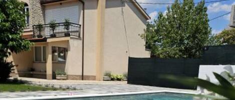 House (Four Bedroom Holiday Home with Swimmi) | Pool | Seasonal outdoor pool