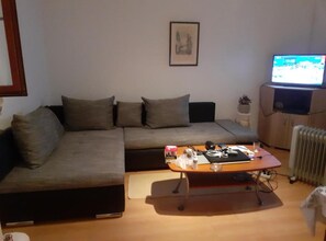 Apartment (Two Bedroom Apartment with Terrace) | Living room | 32-inch flat-screen TV with satellite channels