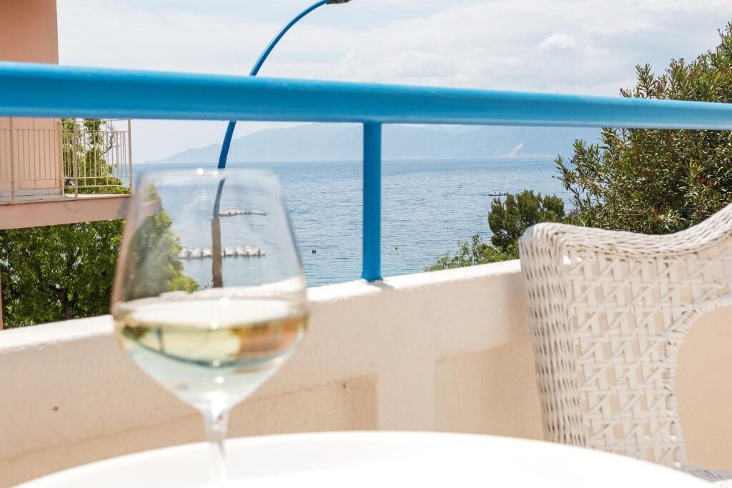 Habitación familiar, balcón, vista a la playa | Áreas de la propiedad