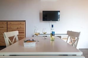 Suite junior, vista a la playa | Restaurantes
