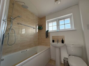 Hair dryer, towels, soap, toilet paper