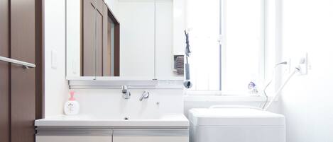 Hair dryer, bidet, towels, soap