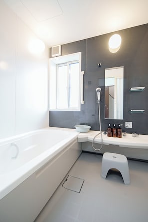 Hair dryer, bidet, towels, soap