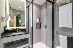 Grand Room, 1 King Bed, Kitchenette | Bathroom | Shower, hair dryer, towels, soap
