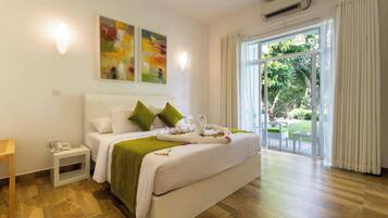 Luxury Suite, River View | In-room safe, blackout drapes, iron/ironing board, free WiFi