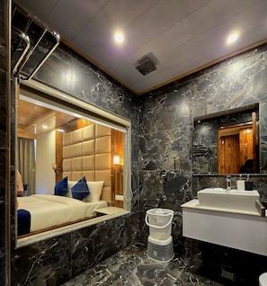 Shower, free toiletries, slippers, towels