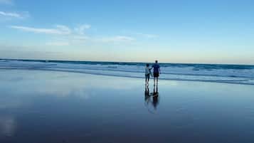 On the beach, sun loungers