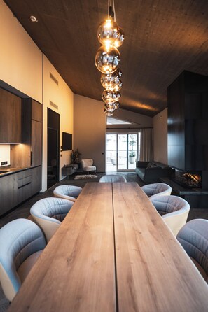 Panoramic Suite, Mountain View | Private kitchen | Full-size fridge, microwave, highchair, cookware/dishes/utensils - Alpine Boutique Hotel wollée (Schladming)