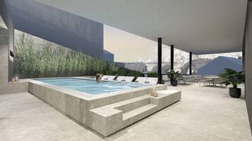 Een buitenzwembad, gratis zwembadcabana's, ligstoelen bij het zwembad