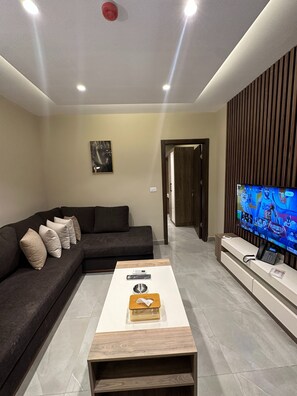 อพาร์ทเมนท์, 1 ห้องนอน, พร้อมสิ่งอำนวยความสะดวกสำหรับผู้พิการ, สูบบุหรี่ได้ | บริเวณนั่งเล่น