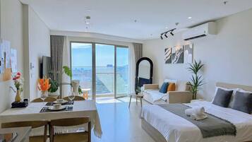 Studio | Individually furnished, desk, laptop workspace, blackout drapes