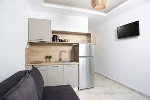 Deluxe Apartment, 1 Bedroom | Private kitchen | Full-size fridge, espresso maker, coffee/tea maker, electric kettle - Gregory Luxury Apartments  (Kassandra)