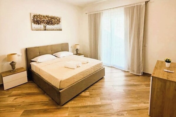 2 quartos, ferros/tábuas de passar roupa, Wi-Fi de cortesia