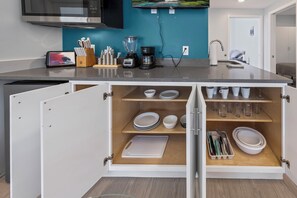 Fridge, microwave, coffee/tea maker, toaster