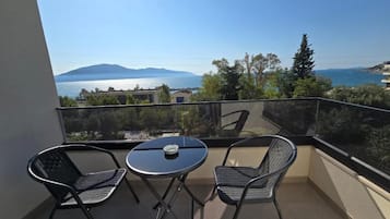 Triple Room, Sea View | Balcony