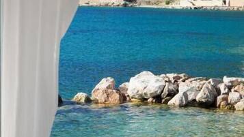 Playa privada, arena blanca, cabañas de playa y tumbonas