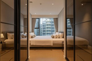 Royal Apartment, 1 Bedroom, Balcony, City View | Hypo-allergenic bedding, minibar, desk, laptop workspace - Metropole Urban Residence (Thu Duc)