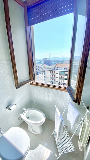 Deluxe Room, City View | Bathroom | Shower, hair dryer, towels, soap