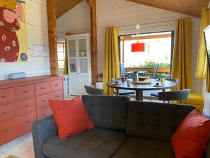 Living area - VILLAGE VACANCES le Lot. Chalet: Swimming pool, Tennis court, Boules pitch, Children's games. (Mauroux)