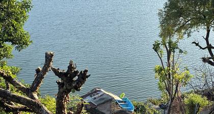 Room or 3-bedroom house in Olomega with WiFi, AC, Lake/Mountain views.