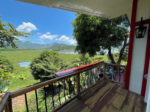 Room or 3-bedroom house in Olomega with WiFi, AC, Lake/Mountain views.