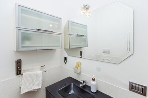 Hair dryer, bidet, towels, soap