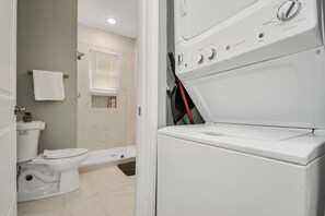 Shower, hair dryer, towels, soap