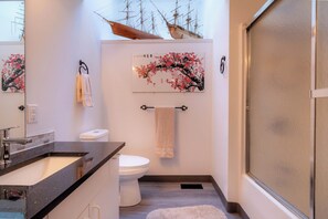 Shower, towels, soap, toilet paper