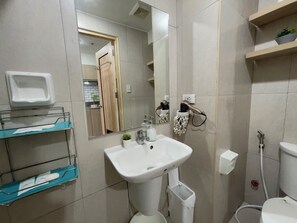 Standard Studio Suite, Balcony, Pool View | Bathroom | Shower, free toiletries, hair dryer, slippers - Davao Inspiria units with balcony  (Davao)