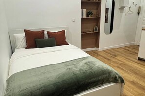1 chambre, fer et planche à repasser, Wi-Fi gratuit, draps fournis