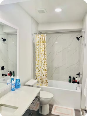 Hair dryer, towels, soap, shampoo