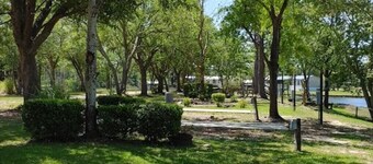 Cozy Cabin with a Private Lake in Fins & Feathers RV Park in Donalsonville GA