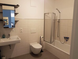 Hair dryer, towels, soap, toilet paper