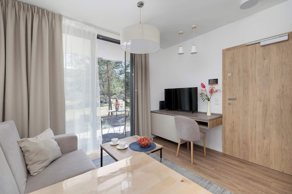 The living area's sleek design is both functional and aesthetically pleasing.