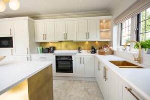 Fridge, microwave, toaster, dining tables