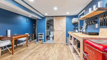 Fridge, microwave, coffee/tea maker, cookware/dishes/utensils