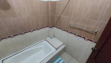 Jetted tub, hair dryer, towels, soap