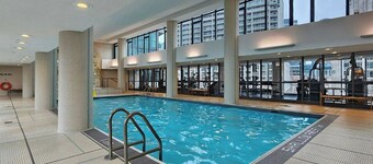 Watch planes takeoff from your balcony! 2+1 BD 2 BA w/ pool, hot tub & parking