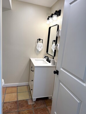 Hair dryer, towels, soap, toilet paper