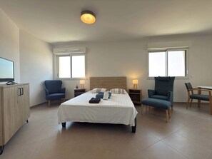 مكواة/لوح كي وواي فاي وملاءات أسرّة