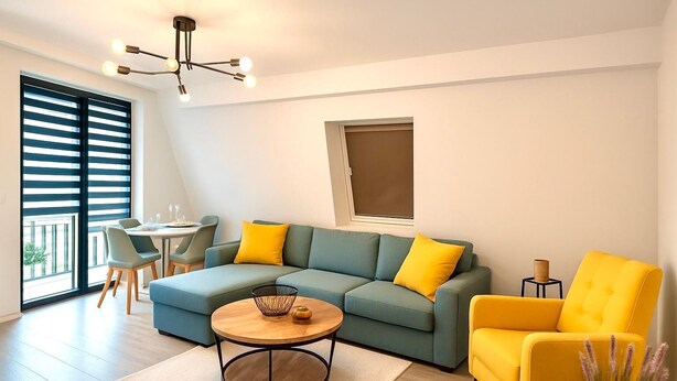 A modern living room with a sectional sofa, a yellow armchair, a round coffee table, and a dining area with a table and chairs. - Central new-build apartment in Siegen (Siegen)